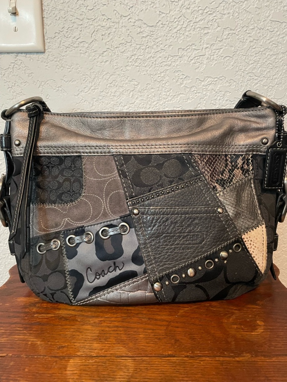 Gorgeous rare Coach shoulder bag. Black and shades of gray patchwork.